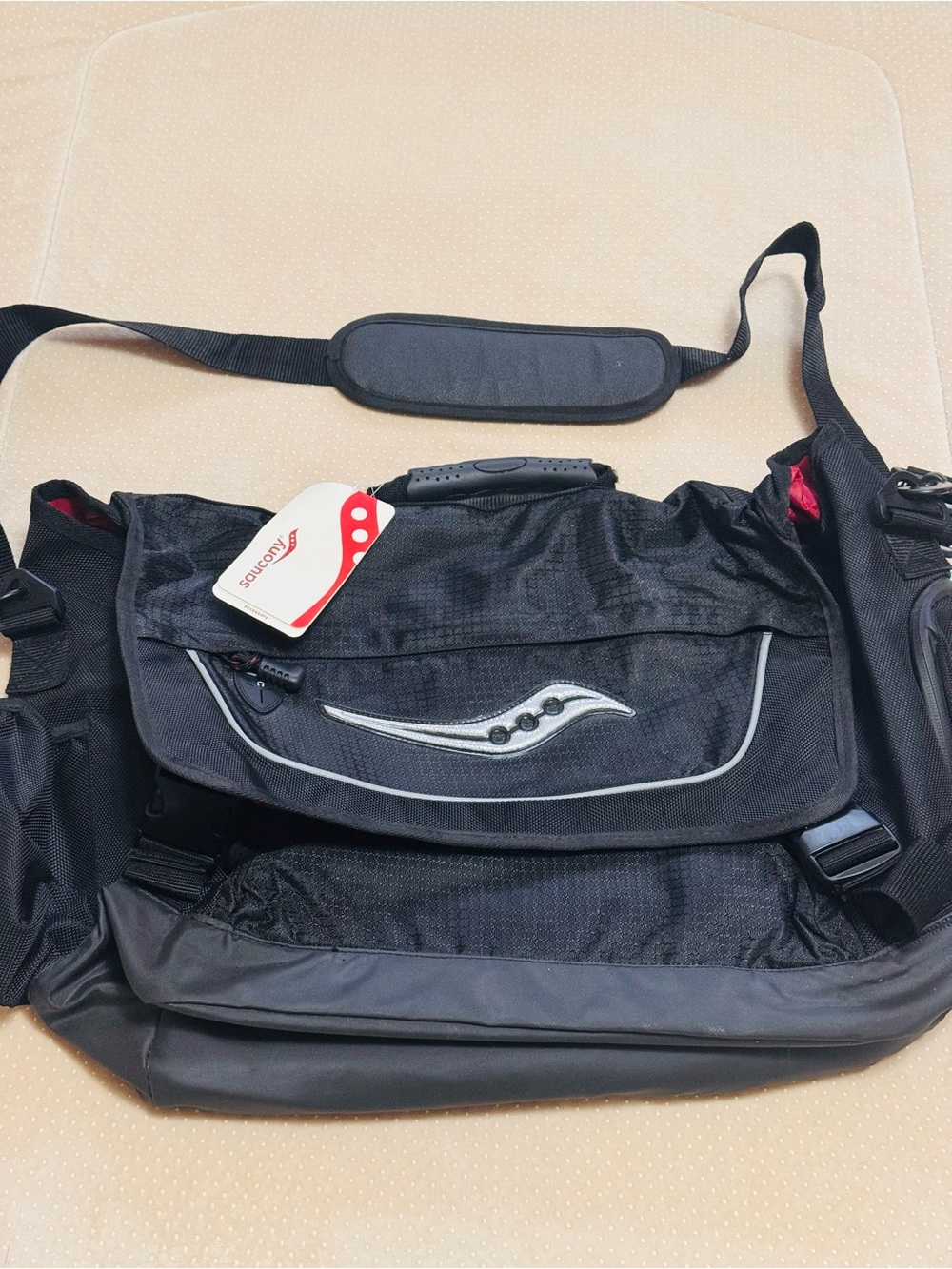 Saucony Black Messenger Bag with Subtle Red Accents